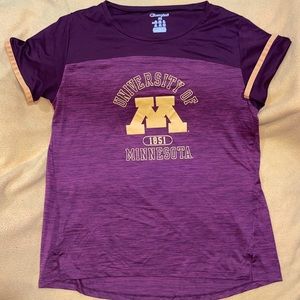 U of M Gophers two tone maroon short sleeve shirt w/ yellow lettering and trim.
